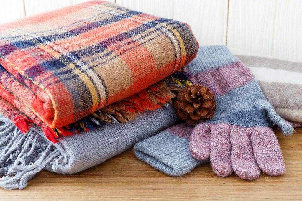 Winter fashion clothing with scarf gloves and blanket