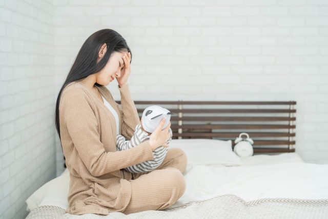 風邪気味の女性