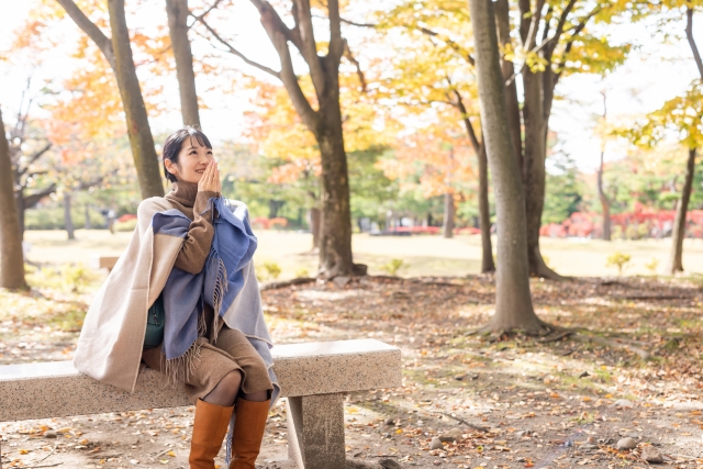 ロングブーツの女性