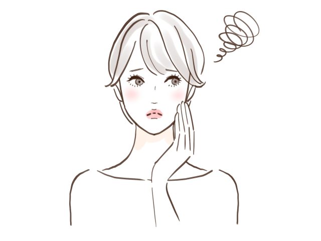 困った顔の女性